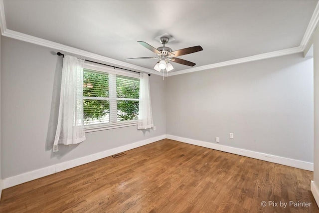 5502 Thelen Ave, Mchenry, IL 60050 - unfurnished room with ornamental molding, wood finished floors, and a ceiling fan