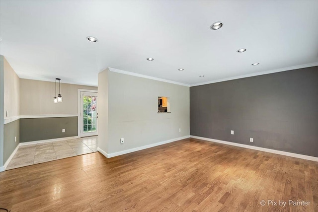 5502 Thelen Ave, Mchenry, IL 60050 - spare room featuring wood finished floors, recessed lighting, and ornamental molding