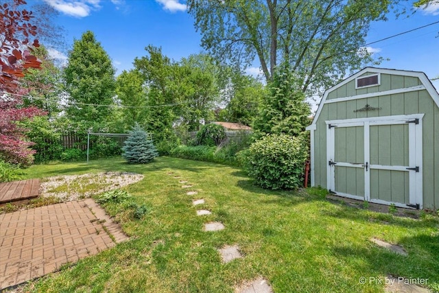 5502 Thelen Ave, Mchenry, IL 60050 - fenced backyard featuring a storage shed
