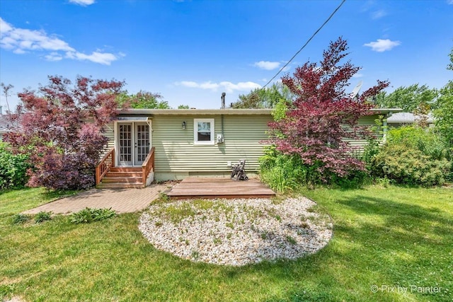 5502 Thelen Ave, Mchenry, IL 60050 - back of house with french doors, a yard, a wooden deck, and entry steps