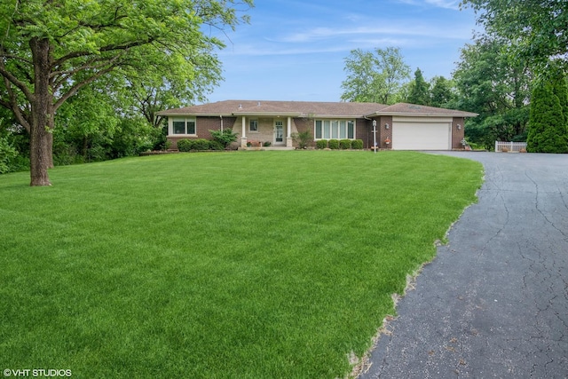 10901 W 131st St, Orland Park, IL 60467 - single story home with brick siding, a garage, driveway, and a front yard