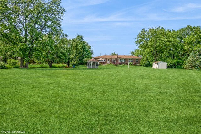 10901 W 131st St, Orland Park, IL 60467 - view of green lawn with a storage unit