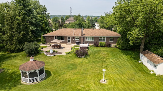 10901 W 131st St, Orland Park, IL 60467 - back of house featuring a gazebo, a patio area, and a lawn