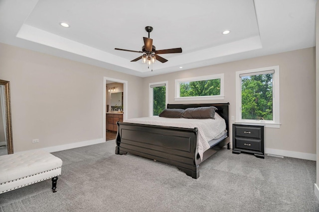 20111 N Woodland Cir, Mokena, IL 60448 - bedroom featuring a tray ceiling, multiple windows, light carpet, and recessed lighting