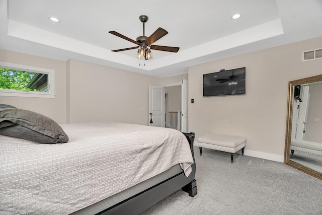 20111 N Woodland Cir, Mokena, IL 60448 - bedroom with a raised ceiling, light carpet, recessed lighting, and a ceiling fan