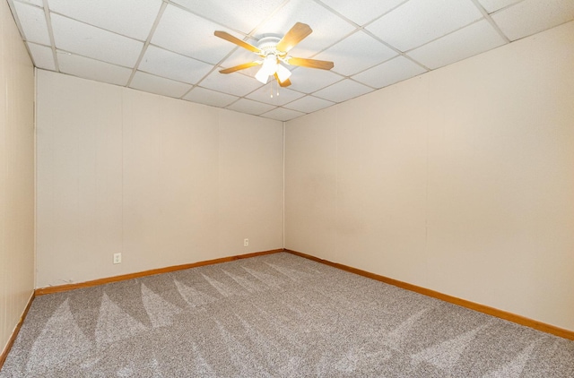 1220 Highland Ave, Lockport, IL 60441 - unfurnished room featuring a paneled ceiling, carpet floors, ceiling fan, and baseboards