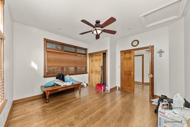 645 Saint Christopher Ct, Aurora, IL 60506 - living area featuring attic access, wood finished floors, and a ceiling fan
