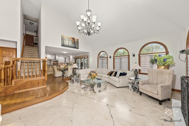 645 Saint Christopher Ct, Aurora, IL 60506 - living area with stairway, high vaulted ceiling, and a chandelier