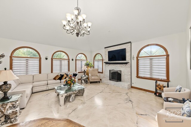645 Saint Christopher Ct, Aurora, IL 60506 - living room with a chandelier, a brick fireplace, and lofted ceiling