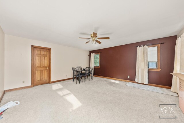 645 Saint Christopher Ct, Aurora, IL 60506 - carpeted empty room featuring a ceiling fan and baseboards