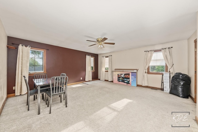 645 Saint Christopher Ct, Aurora, IL 60506 - carpeted dining space with plenty of natural light and ceiling fan