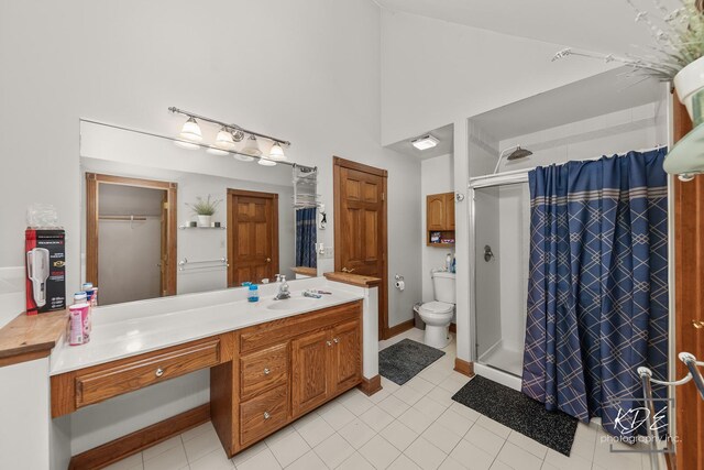 645 Saint Christopher Ct, Aurora, IL 60506 - full bath featuring a stall shower, vanity, high vaulted ceiling, and tile patterned flooring