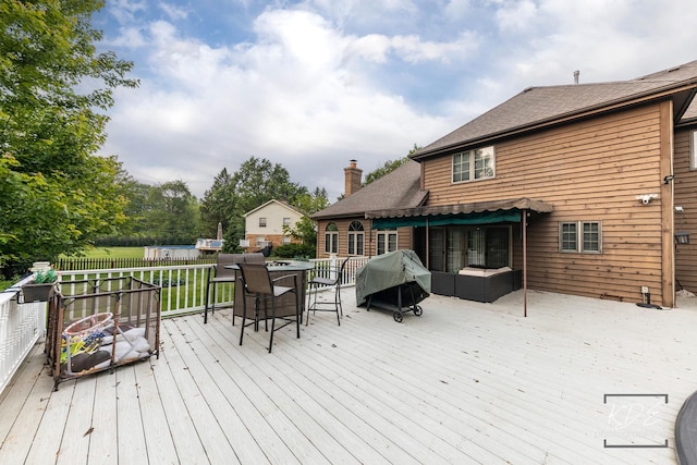 645 Saint Christopher Ct, Aurora, IL 60506 - deck with a grill, outdoor dining area, and an outdoor living space