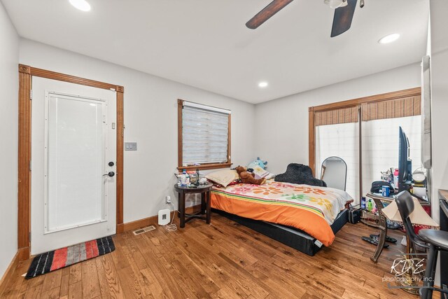645 Saint Christopher Ct, Aurora, IL 60506 - bedroom with wood finished floors, recessed lighting, and ceiling fan