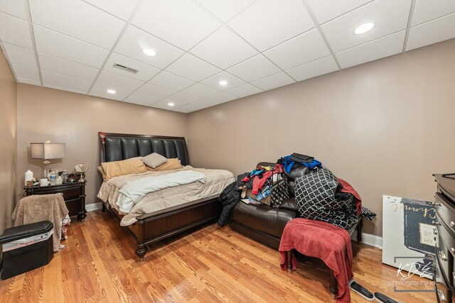 645 Saint Christopher Ct, Aurora, IL 60506 - bedroom with light wood-style floors, recessed lighting, and a paneled ceiling