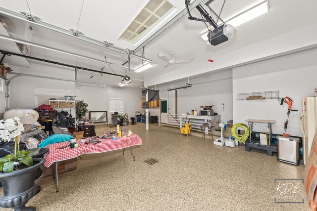 645 Saint Christopher Ct, Aurora, IL 60506 - garage featuring a garage door opener
