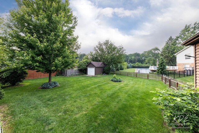 645 Saint Christopher Ct, Aurora, IL 60506 - fenced backyard with a storage shed