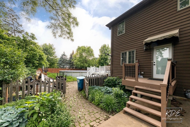 645 Saint Christopher Ct, Aurora, IL 60506 - view of yard with a deck and stairway