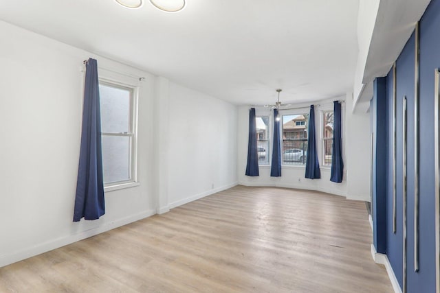 8807 S Lowe Ave, Chicago, IL 60620 - spare room featuring light wood finished floors and healthy amount of natural light