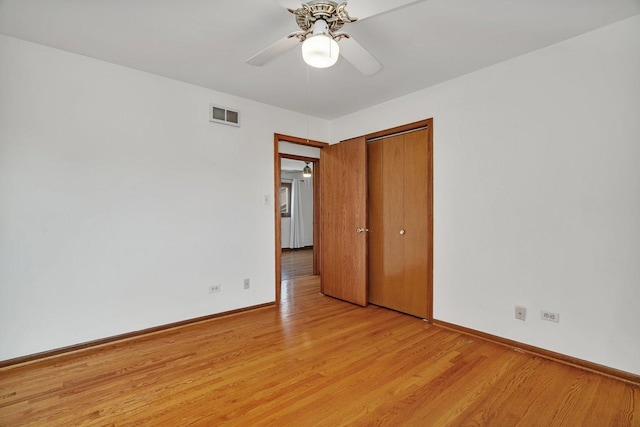 8932 Pebble Beach Ln, Orland Park, IL 60462 - spare room featuring light wood finished floors and a ceiling fan