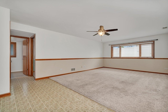 8932 Pebble Beach Ln, Orland Park, IL 60462 - carpeted spare room featuring a ceiling fan and baseboards