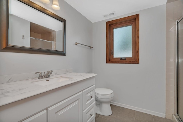 8932 Pebble Beach Ln, Orland Park, IL 60462 - full bathroom with vanity, a shower with door, and tile patterned flooring