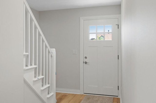 7810 N Neva Ave, Niles, IL 60714 - foyer featuring light wood finished floors and stairs