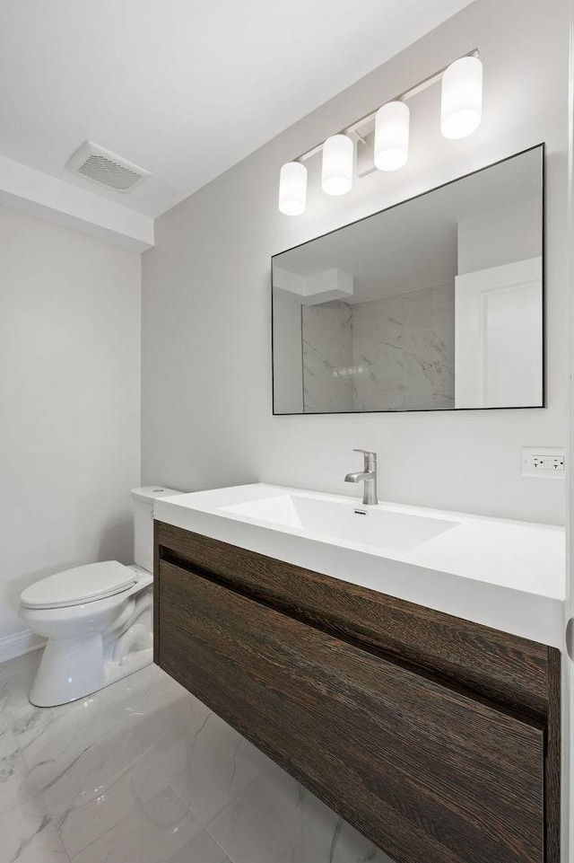 7810 N Neva Ave, Niles, IL 60714 - full bath with marble look tile flooring, vanity, and a marble finish shower