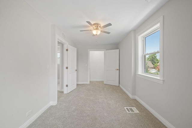 7810 N Neva Ave, Niles, IL 60714 - unfurnished bedroom with carpet flooring and a ceiling fan
