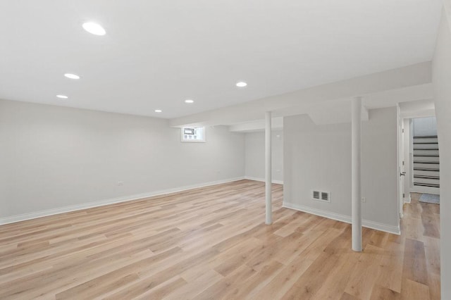 7810 N Neva Ave, Niles, IL 60714 - basement with light wood-type flooring, stairway, and recessed lighting