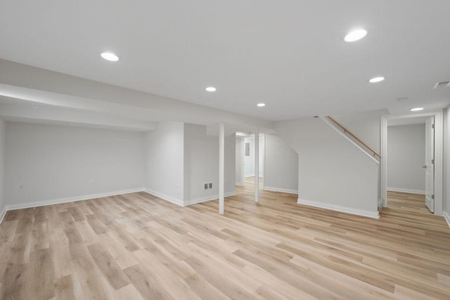 7810 N Neva Ave, Niles, IL 60714 - finished below grade area with light wood-type flooring and recessed lighting