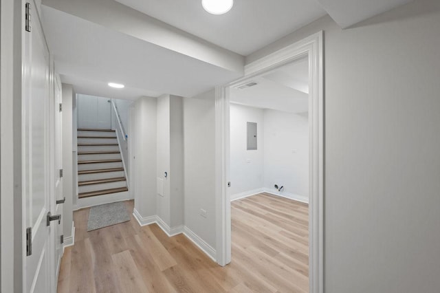 7810 N Neva Ave, Niles, IL 60714 - stairway featuring electric panel and wood finished floors
