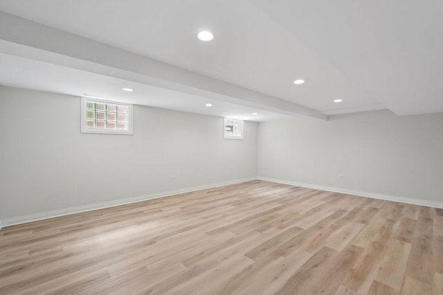 7810 N Neva Ave, Niles, IL 60714 - basement featuring healthy amount of natural light, light wood-style floors, and recessed lighting
