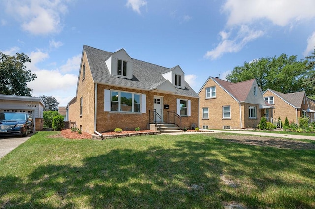 7810 N Neva Ave, Niles, IL 60714 - cape cod home featuring brick siding and a front lawn