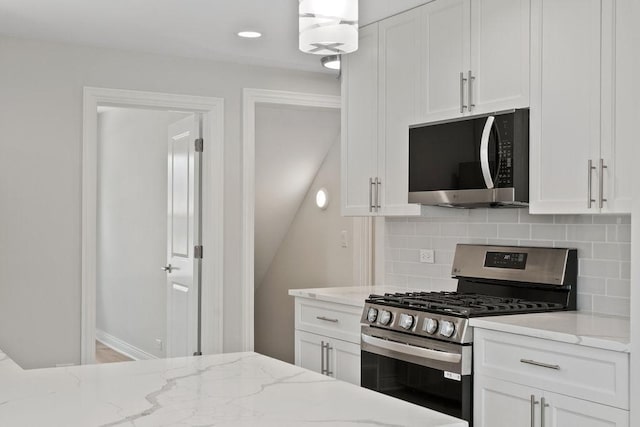 7810 N Neva Ave, Niles, IL 60714 - kitchen featuring appliances with stainless steel finishes, backsplash, white cabinets, light stone counters, and recessed lighting