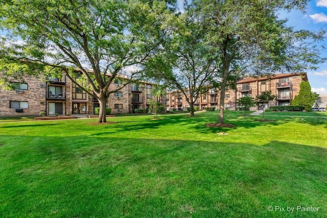 134 Klein Creek Ct Unit 4D, Carol Stream, IL 60188 - view of community featuring a lawn