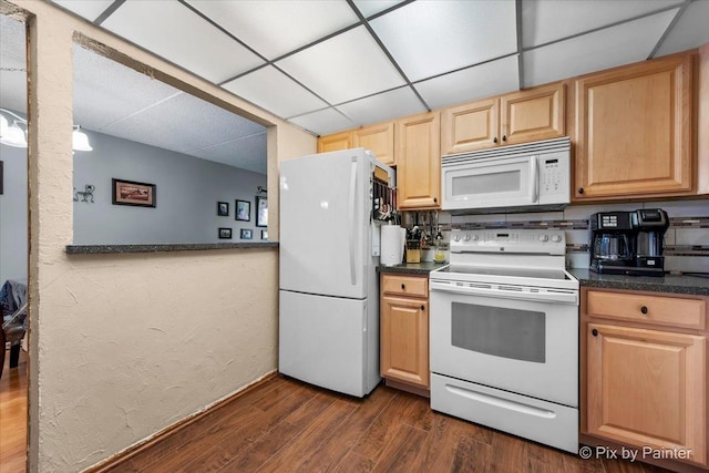 134 Klein Creek Ct Unit 4D, Carol Stream, IL 60188 - kitchen featuring white appliances, a drop ceiling, dark countertops, dark wood-style flooring, and light brown cabinets