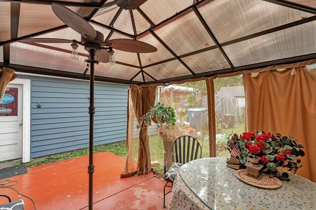 5203 W Court St, Monee, IL 60449 - sunroom featuring lofted ceiling, a ceiling fan, and outdoor dining space