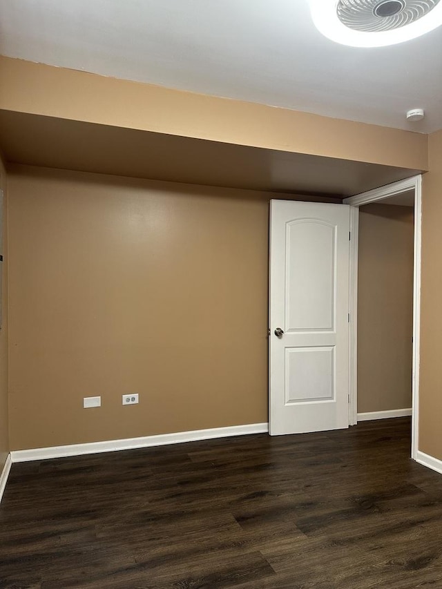 19205 Ada St, Lansing, IL 60438 - basement featuring dark wood-style flooring and baseboards