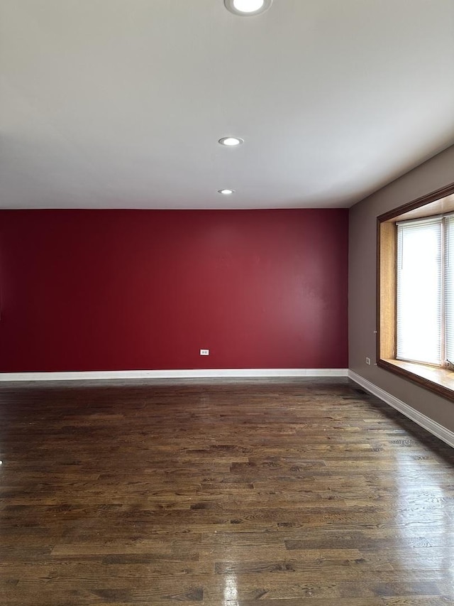 19205 Ada St, Lansing, IL 60438 - empty room with dark wood-type flooring and recessed lighting