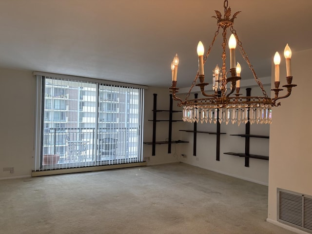 6007 N Sheridan Rd Unit 24H, Chicago, IL 60660 - unfurnished dining area featuring plenty of natural light, a chandelier, and carpet floors