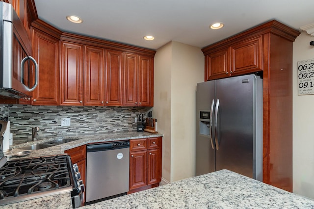 1262 N Kennedy Dr, Streamwood, IL 60107 - kitchen featuring appliances with stainless steel finishes, backsplash, light stone counters, and recessed lighting