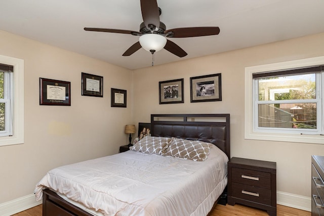 1262 N Kennedy Dr, Streamwood, IL 60107 - bedroom featuring light wood-type flooring and ceiling fan