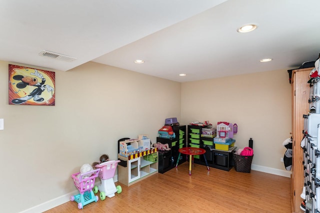 1262 N Kennedy Dr, Streamwood, IL 60107 - game room featuring wood finished floors and recessed lighting