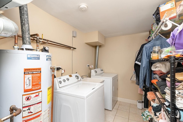 1262 N Kennedy Dr, Streamwood, IL 60107 - laundry area with water heater, washer and clothes dryer, and light tile patterned floors