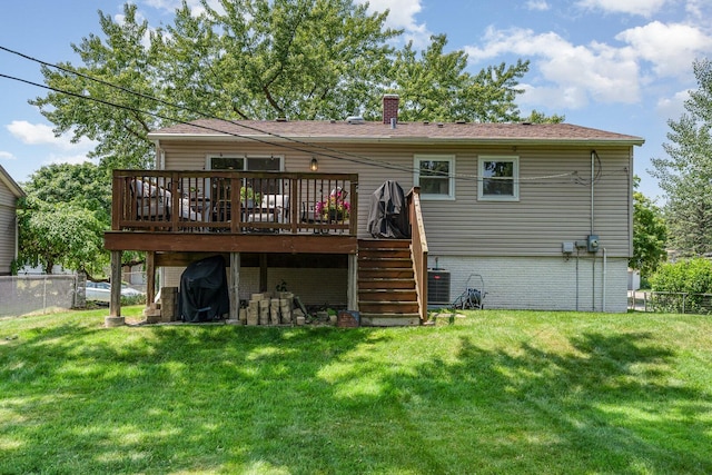 1262 N Kennedy Dr, Streamwood, IL 60107 - back of property with a wooden deck, stairs, and a chimney