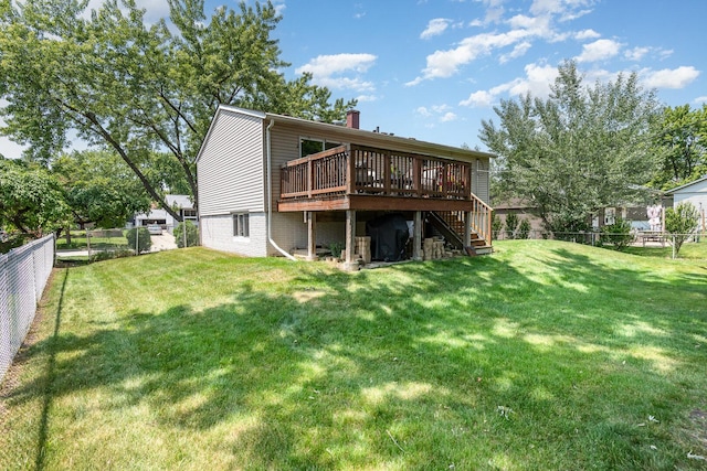 1262 N Kennedy Dr, Streamwood, IL 60107 - rear view of house with a deck, a fenced backyard, stairs, and a chimney