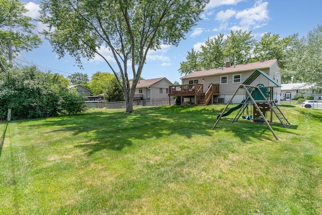 1262 N Kennedy Dr, Streamwood, IL 60107 - view of yard featuring a playground, a deck, and stairs