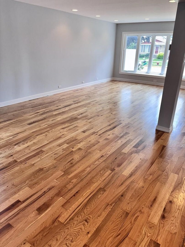 7032 W 63rd Pl, Chicago, IL 60638 - empty room featuring wood finished floors and recessed lighting