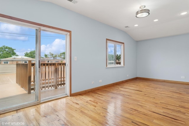 7032 W 63rd Pl, Chicago, IL 60638 - spare room with light wood-type flooring, lofted ceiling, and recessed lighting